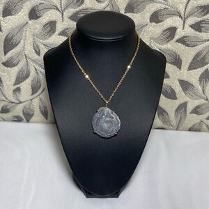 Necklace with chalcedony pendant and 18k gold plated chain.